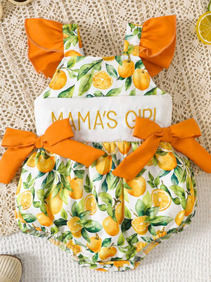 Baby romper with orange fruit print, ruffled sleeves, and Mama's Girl embroidery.