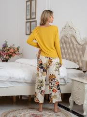Yellow long sleeve top and botanical print lounge pants with tie detail