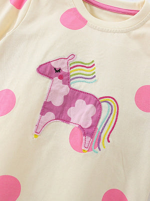 Cream cotton pajama top with pink polka dots and a pink unicorn applique.