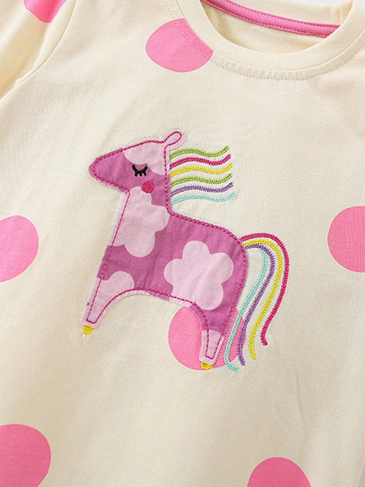 Cream cotton pajama top with pink polka dots and a pink unicorn applique.