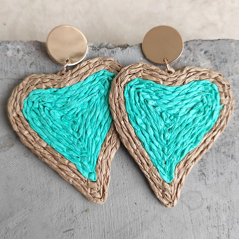 Aqua woven heart statement earrings with gold posts.