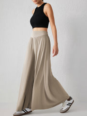 Khaki drape-front wide-leg jersey trousers with a high waist and subtle side slit.