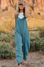 French blue cotton V-neck wide-leg jumpsuit with pockets and a relaxed fit.
