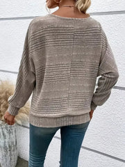 Khaki ribbed acrylic sweatshirt with dolman sleeves and a crew neck.