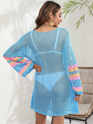 Light blue crochet cover-up with striped bell sleeves and a scoop neck.