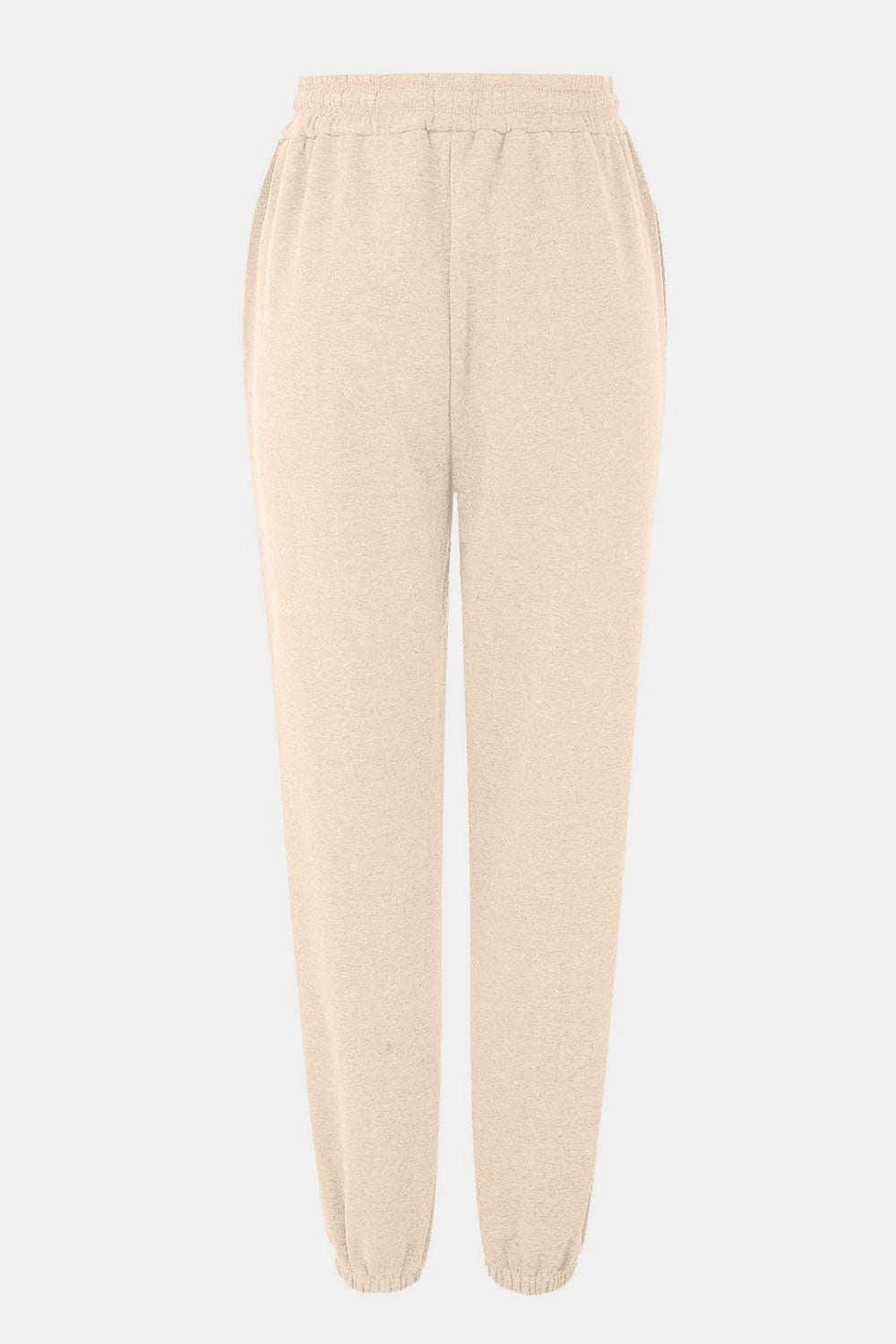 Relaxed-fit cuffed sweatpants in pastel yellow with elastic waistband and pockets.
