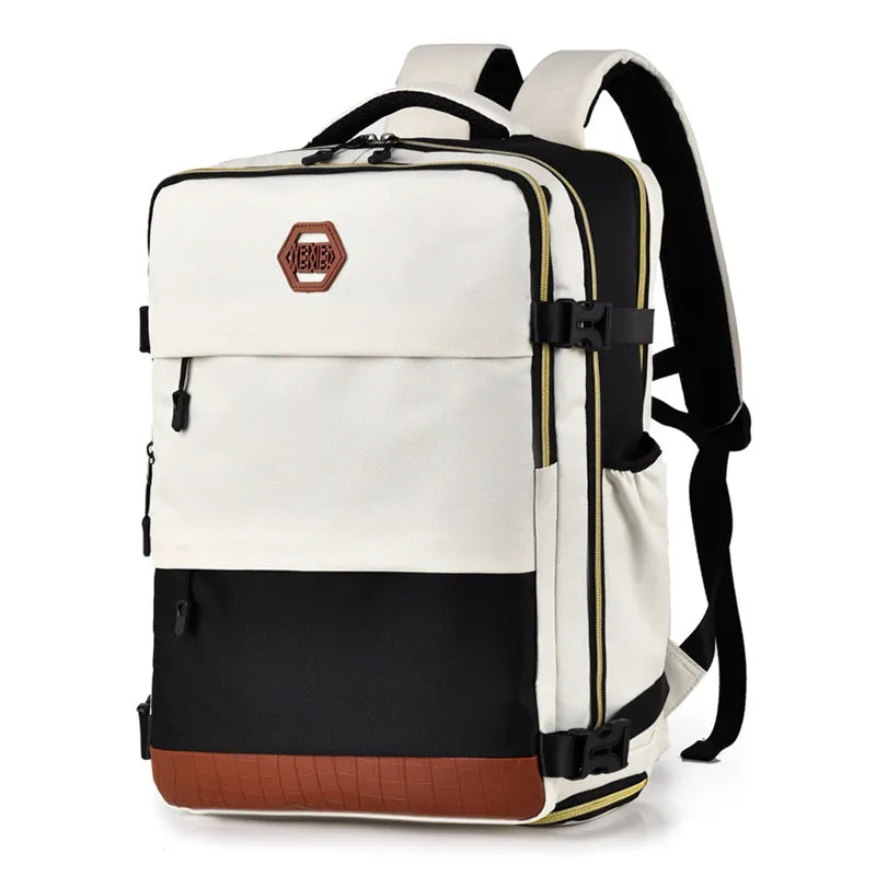 Travel backpack with contrast panels in white, black, and brown faux leather trim.
