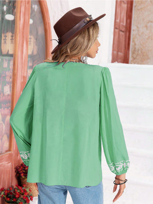 Gum Leaf green blouse with embroidered cuffs and gathered bodice detail