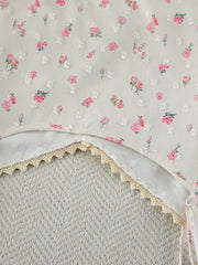 Floral cami and shorts set with lace trim and textured fabric detail.