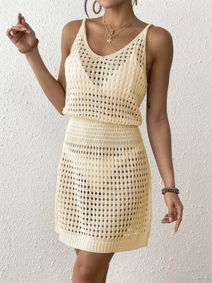 Beige openwork V-neck cover-up dress with a fitted waist and crochet knit detail.