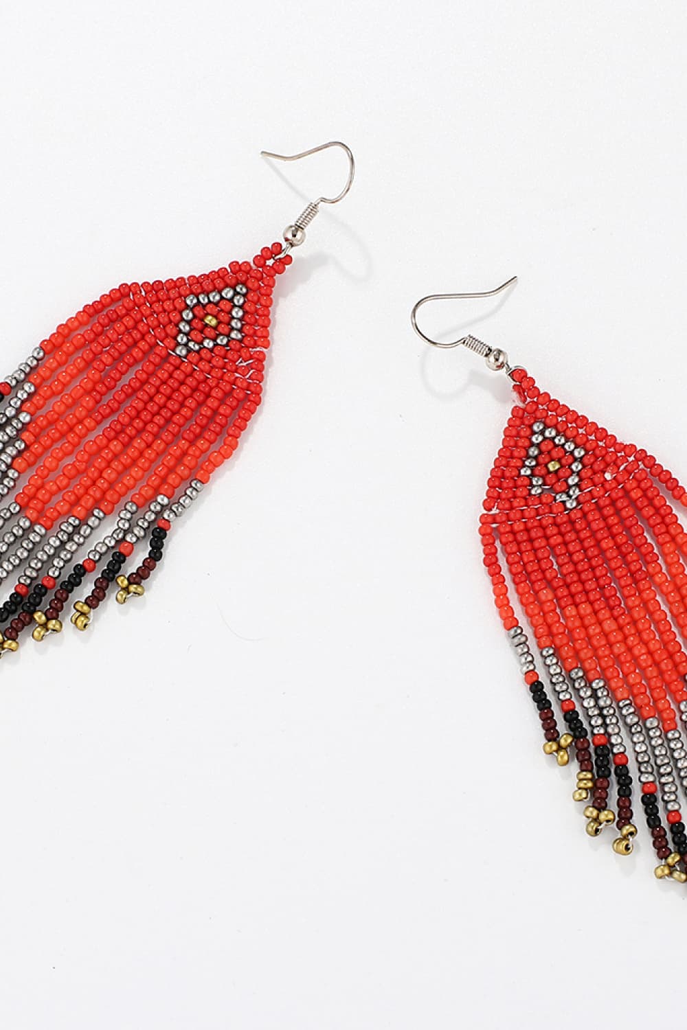Beaded diamond fringe earrings in red, black, and silver with gold accents.
