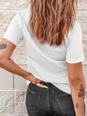 White cotton graphic t-shirt with short sleeves and a relaxed fit.
