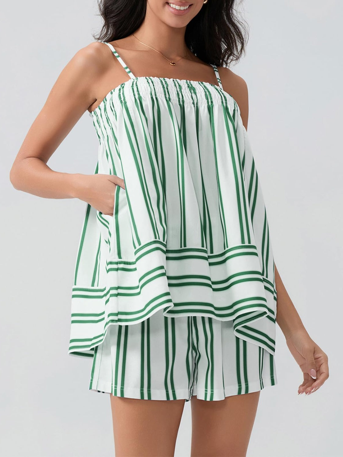 White and green striped cami set with smocked bodice and shorts with pockets.