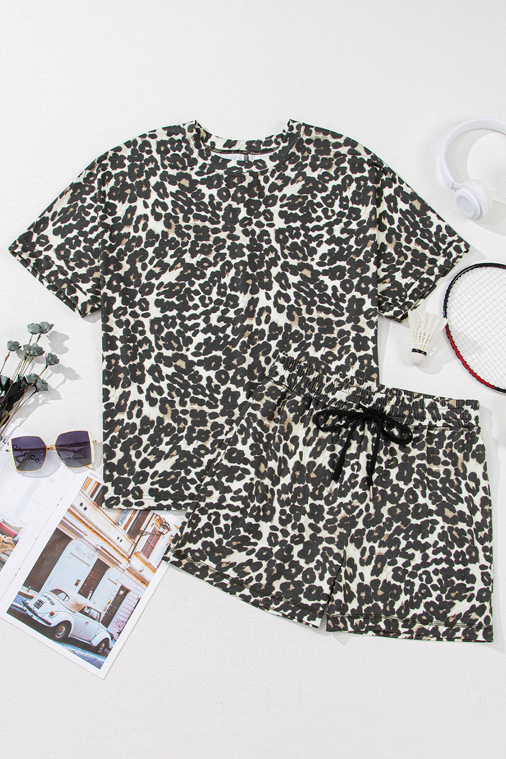 Relaxed leopard print loungewear set with a t-shirt and drawstring shorts.