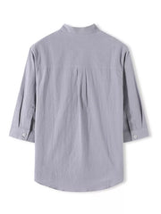Grey cotton casual shirt with Mandarin collar and 3/4 sleeves, buttoned cuffs, back pleats.