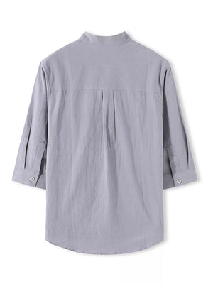Grey cotton casual shirt with Mandarin collar and 3/4 sleeves, buttoned cuffs, back pleats.