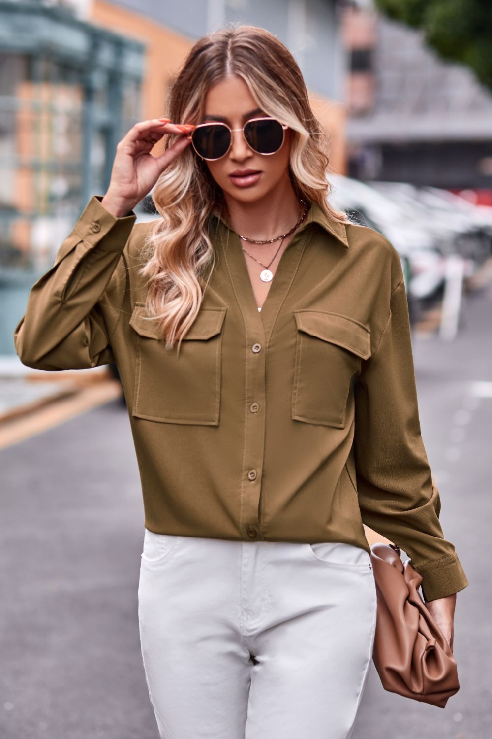 Oversized utility shirt in matcha green with two chest pockets and button front.