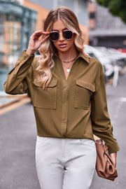 Oversized utility shirt in matcha green with two chest pockets and button front.