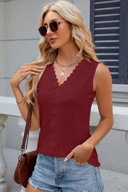 Sleeveless V-neck top in Rust with scalloped eyelet detail and textured panels.