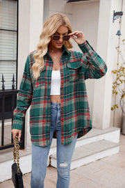 Green plaid overshirt with patch pockets and buttoned front, styled casually.