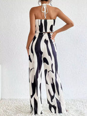 Black and white abstract print halter crop top and wide leg pants set, polyester.