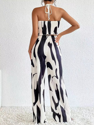 Black and white abstract print halter crop top and wide leg pants set, polyester.