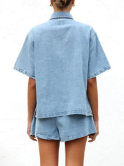 Light wash denim co-ord set with short sleeve button-up shirt and shorts.
