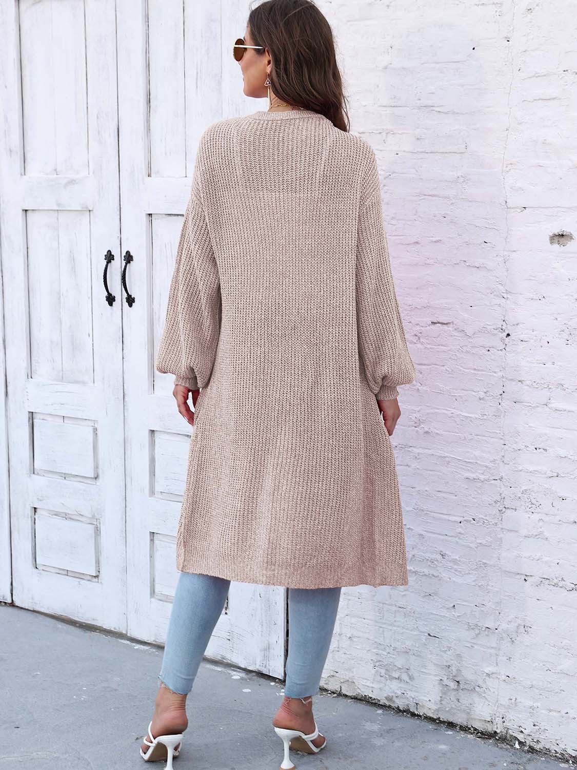 Ribbed knit maxi cardigan in khaki with long sleeves and pockets.