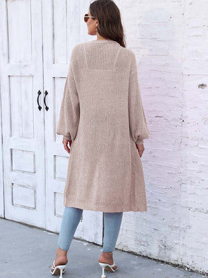 Ribbed knit maxi cardigan in khaki with long sleeves and pockets.