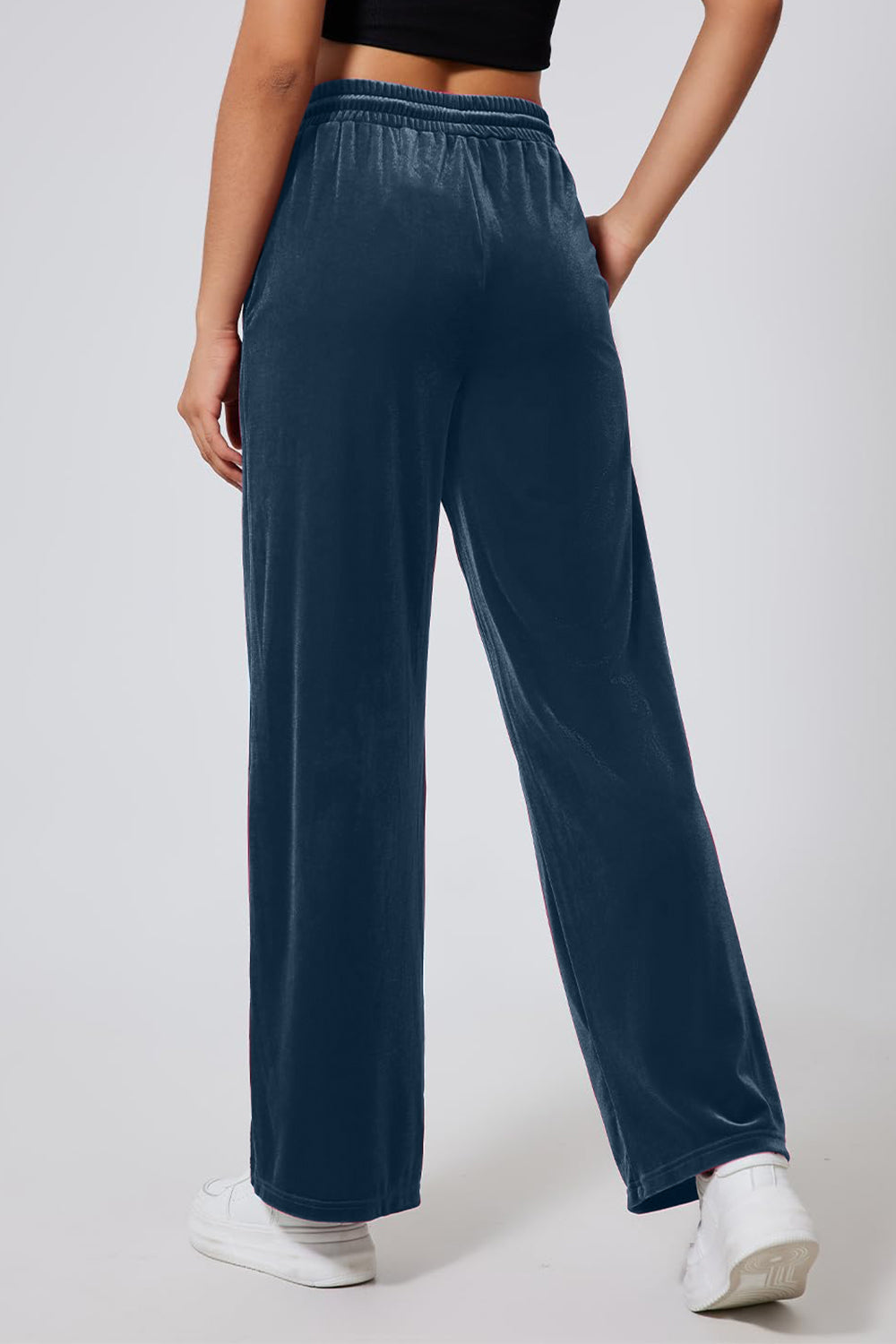 Deep Teal velvet palazzo lounge trousers with a drawstring waist and side stripe detail.