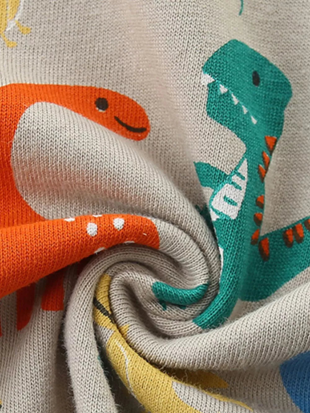 Toddler crew-neck tee in light gray cotton with a dinosaur print featuring orange and green dinosaurs.