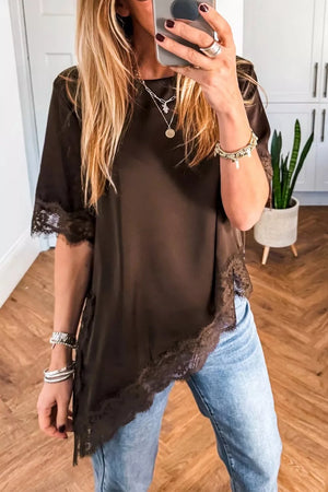 Chic asymmetric brown satin blouse with lace trim and short sleeves.