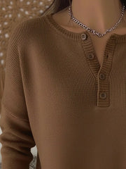 Brown buttoned long-sleeve knit top with a crew neckline and ribbed texture.
