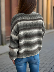 Ombre stripe fluffy knit crewneck jumper in dark gray with horizontal stripes and a soft texture.