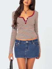Striped henley shirt with contrast collar and buttons, long sleeves, brown and white stripes.
