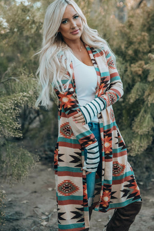 Southwestern print duster cardigan with stripe cuff sleeves and open front.