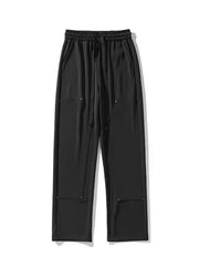 Men's black relaxed fit drawstring sweatpants with pocket details