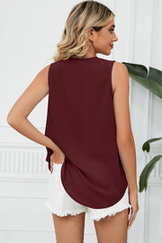 Burgundy V-neck tank top with lace trim and curved hem