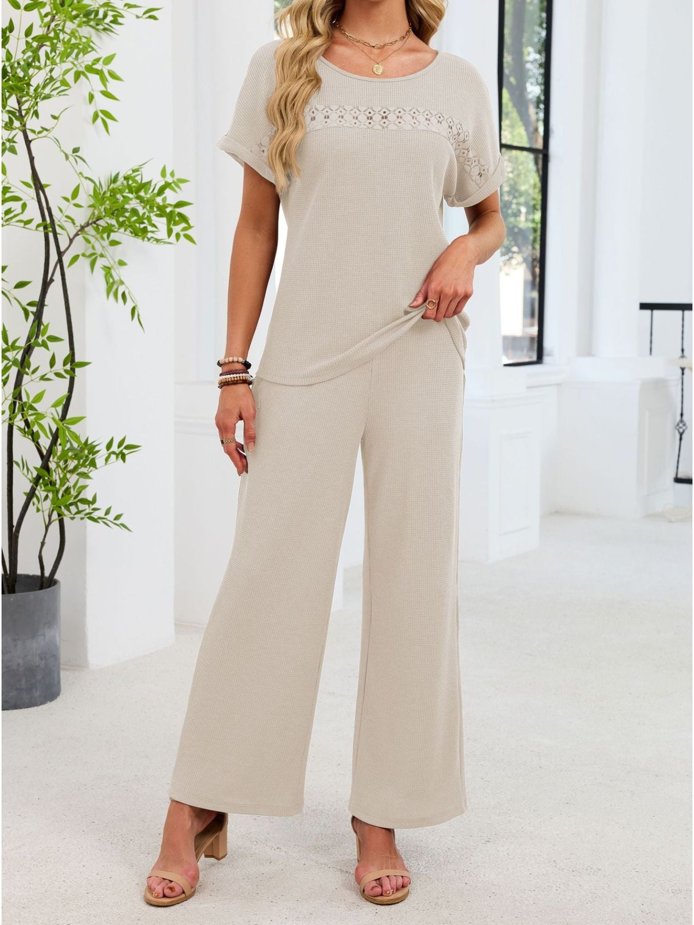 Beige lace cutout two-piece set with short sleeves and wide-leg pants