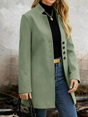 Chic longline trench coat in Matcha Green with button-down front and collarless neckline.