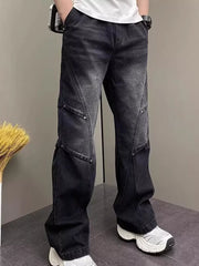 Distressed black wide-leg jeans with panel detailing and a vintage wash.