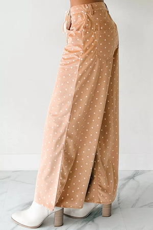 Polka dot drawstring wide-leg maternity trousers in tan with white dots.