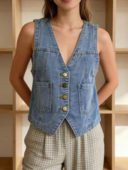 Light blue denim vest with brass buttons, V-neck, and two chest pockets.