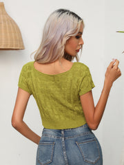 Yellow-green cable knit crop top with square neckline and short sleeves.