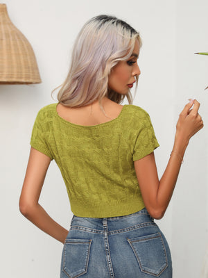 Yellow-green cable knit crop top with square neckline and short sleeves.