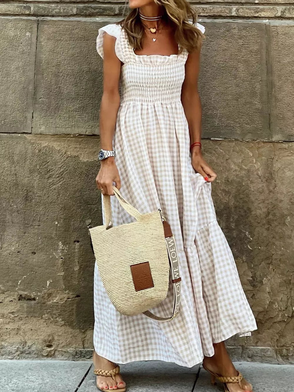 White gingham ruffled maxi dress with smocked bodice and square neckline.