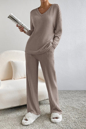 Cozy ribbed knit loungewear set in tan with V-neck sweater and wide-leg pants.