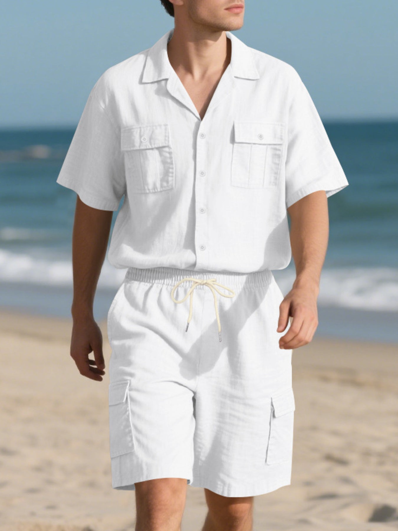 White relaxed-fit button-up shirt with two chest pockets and drawstring cargo shorts set.