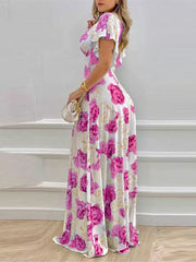 Maxi dress with V-neck, ruffle sleeves, and a bold floral print in Fuchsia Pink.