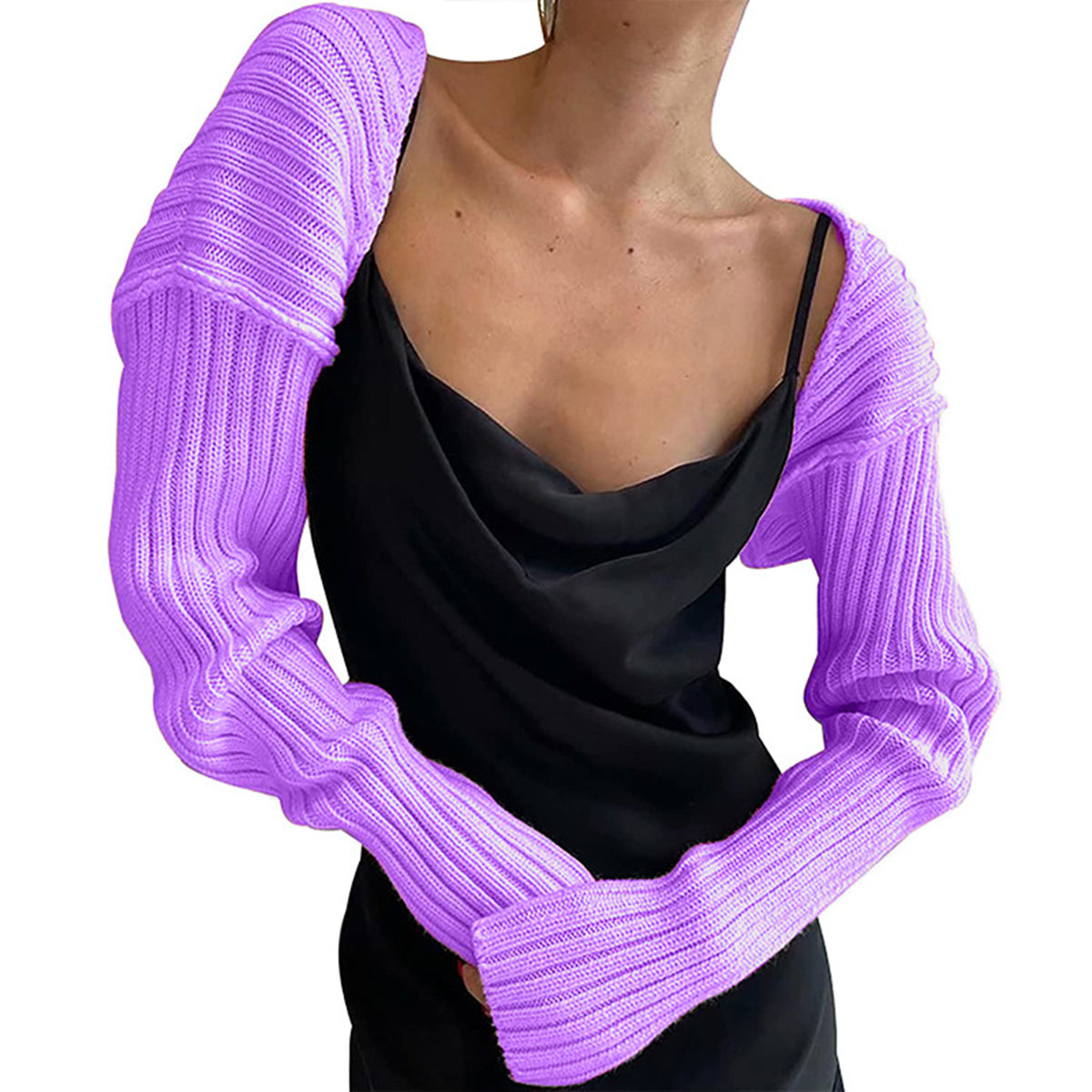 Lavender ribbed knit shrug with extended sleeves, worn over a black slip dress.